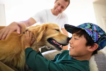 boy with dad and dog